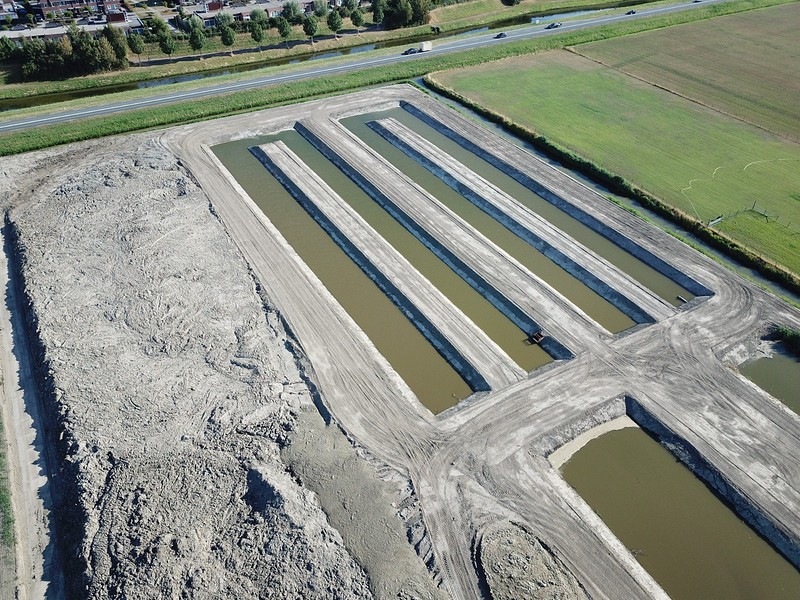 Herinrichten spoel-/bezinkbassin